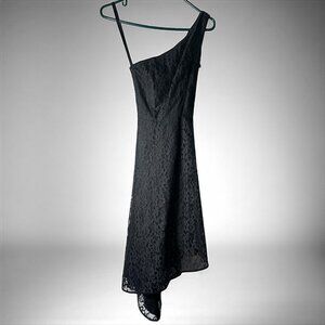 Elegant black lace one-shoulder dress with asymmetrical hemline.